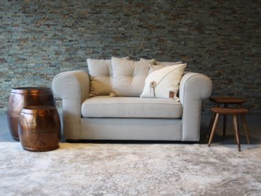 Rural / classic beige loveseat with decorative cushions