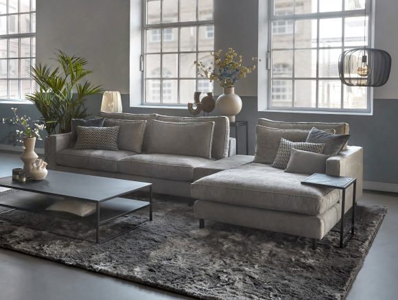 Corner sofa Gigi in beige fabric with black metal coffee table