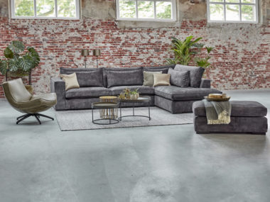 Corner sofa Annabelle in velvet, in a gray color. With matching footstool.