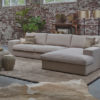 corner sofa Victoria in a natural beige fabric and a large rug