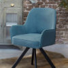 Dining room chair Kenny X in a gray-blue fabric with a black X-leg.