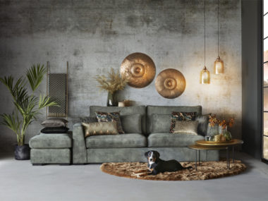 3-seater sofa Jolie with footstool in Hunter Green with round rug and decorative cushions