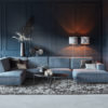 Kundenspezifischer Teppich Marino in einer warmen grauen Farbe Nummer 22. mit einem blaugrauen Ecksofa.