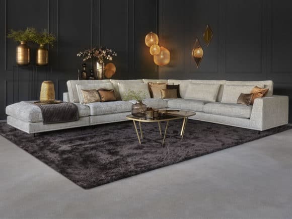 Spacious corner sofa in a soft Natural fabric with a large rug