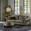 3-seater sofa Claire in Thyme green with large rug