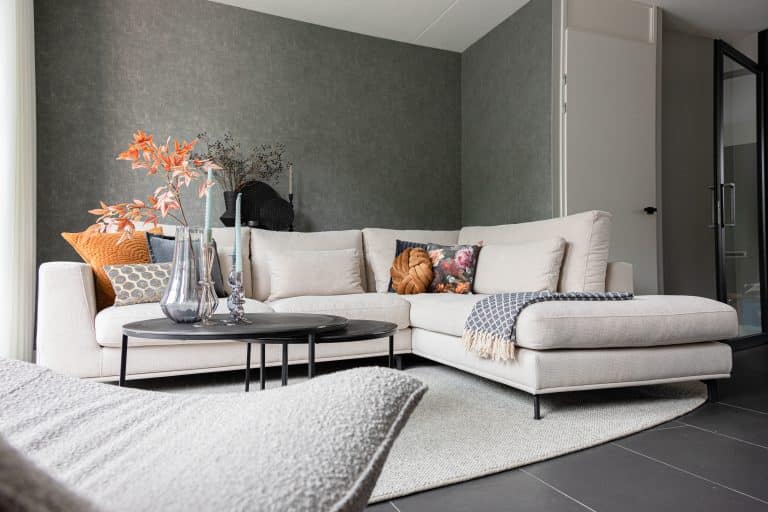 Modern home: interior view corner sofa carmen in a beige fabric