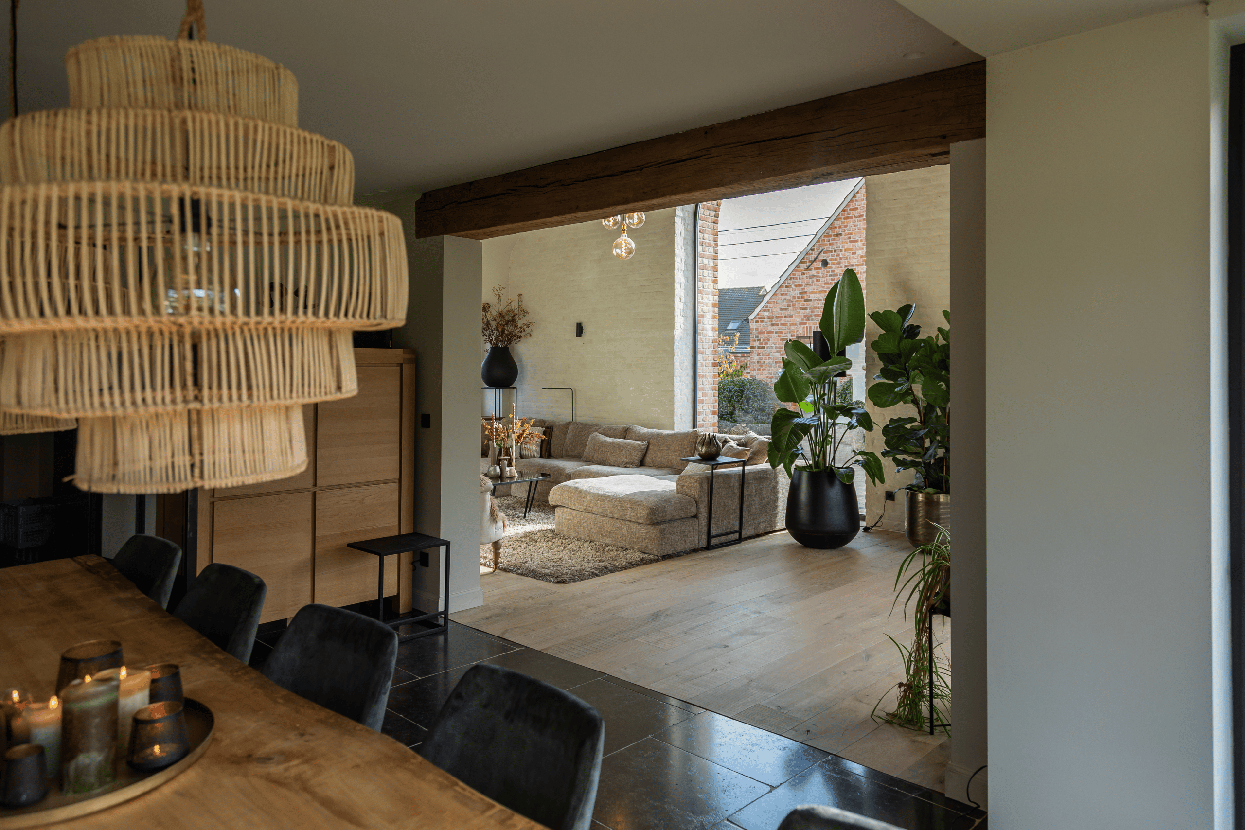 Indoor viewer Meulebeke with Room108 corner sofa Noëlle. Rustic modern interior.