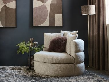 Round armchair Elle with matching organic footstool. Beige fabric with natural styling.