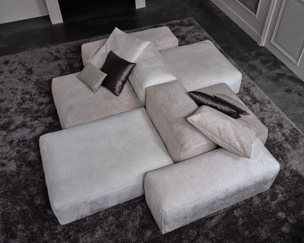 Top view of sectional sofa in a beige fabric in two tones. Natural and chic styling.