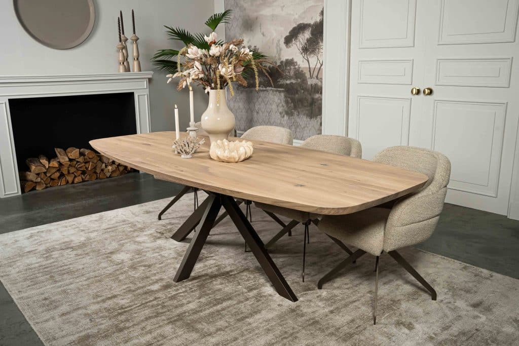 The Danish oval dining table Montpellier with asymmetrical spider leg from Room108