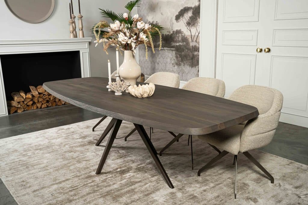 The Danish oval dining table Montpellier with a tapered spider leg of Room108