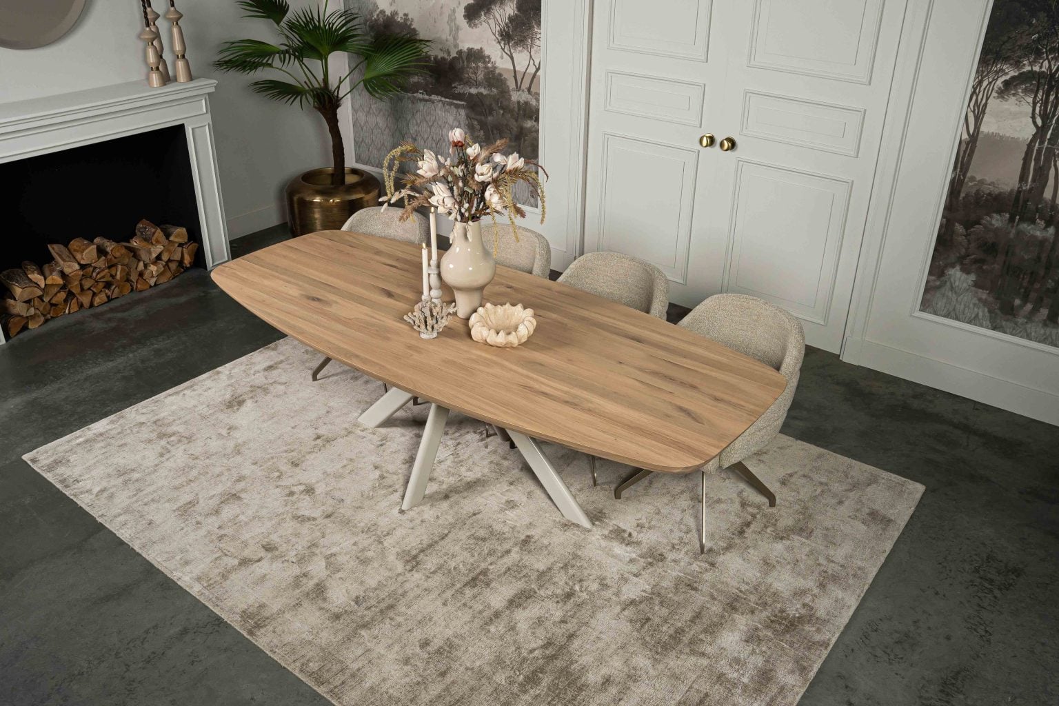 The Danish oval dining table Montpellier with a white/cream Spider leg from Room108.